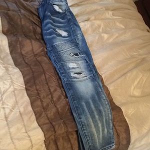 Light blue distressed jeans